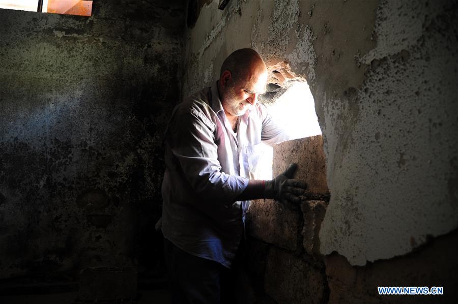 SYRIA-DAMASCUS-DARAYA-PEOPLE-RETURN-HOME