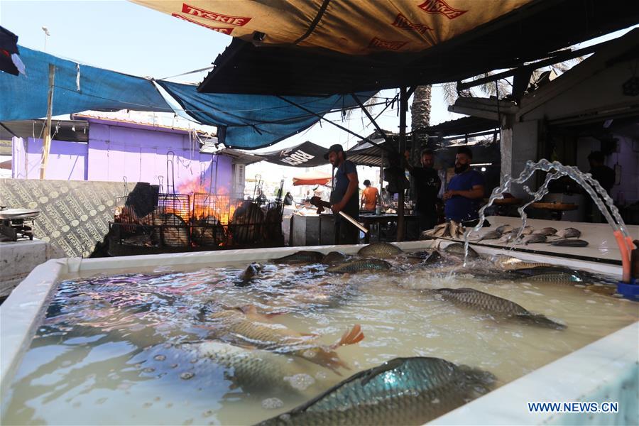 IRAQ-BAGHDAD-MASGOUF-GRILLED FISH