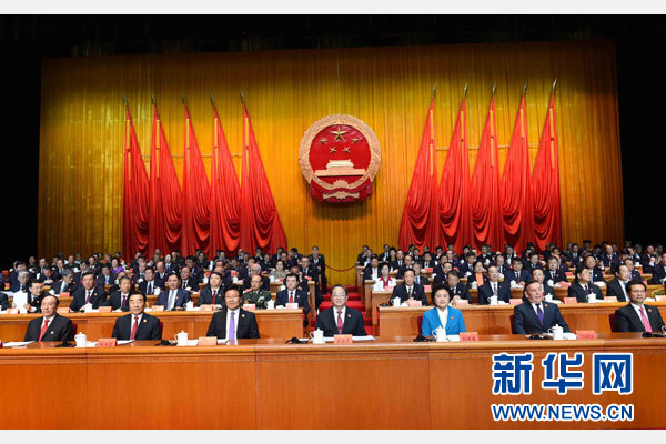 10月1日，慶祝中華人民共和國成立66周年暨新疆維吾爾自治區(qū)成立60周年大會在新疆人民會堂隆重舉行。 新華社記者 饒愛民 攝