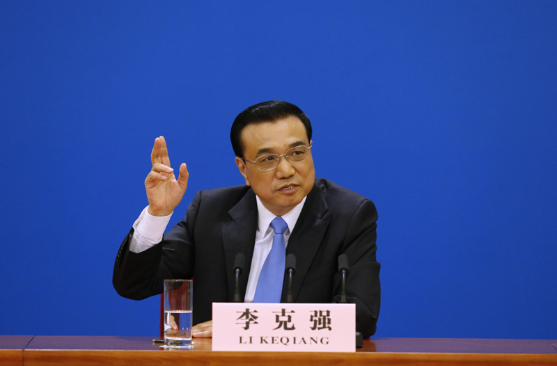 3月15日，國務院總理李克強在北京人民大會堂與中外記者見面，并回答記者提問。 新華社記者 沈伯韓 攝