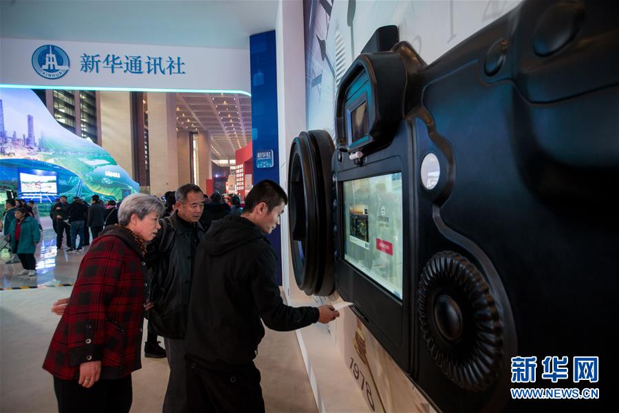 (圖文互動)(4)筆墨書崢嶸 光影繪壯美——慶祝改革開放40周年大型展覽新華社展項掃描