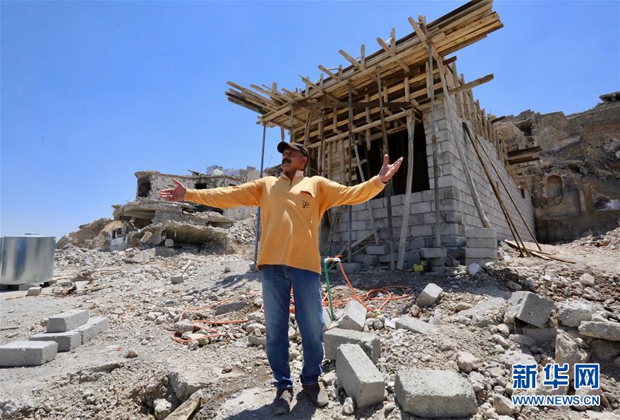 （國(guó)際·圖文互動(dòng)）（5）通訊：中企員工愛(ài)心捐款助摩蘇爾老城民眾重燃生活希望