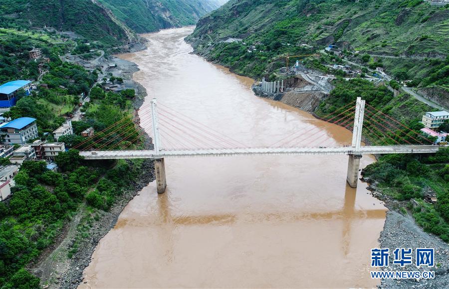 (新華全媒頭條·壯麗70年·奮斗新時(shí)代——記者再走長征路·圖文互動(dòng))(3)前進(jìn),向著光明的方向——尋訪金沙江畔紅色印記