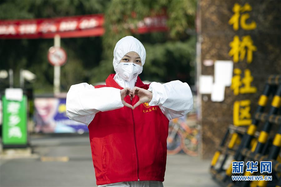 （新華全媒頭條·圖文互動）（14）星火成炬——記戰“疫”中的志愿服務英雄