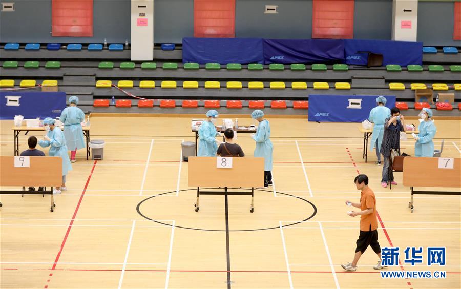 (圖文互動)(4)“身為醫護人員一分子,應該出來幫忙”——參與新冠病毒社區檢測的香港醫護人員速寫