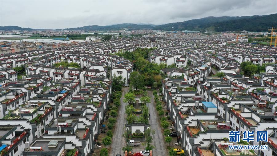 (走向我們的小康生活·圖文互動(dòng))(1)“云南第一村”,共同富裕為什么能?