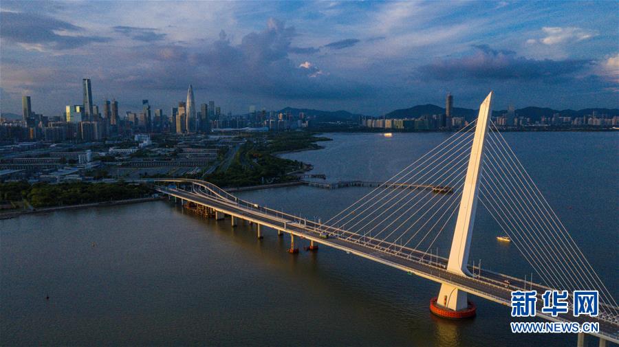 (在習近平新時代中國特色社會主義思想指引下——新時代新作為新篇章·習近平總書記關切事·圖文互動)(1)我家大門常打開——經濟特區全方位對外開放故事