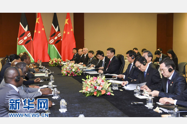 12月3日，國家主席習近平在約翰內斯堡會見肯尼亞總統肯雅塔。新華社記者 謝環馳 攝